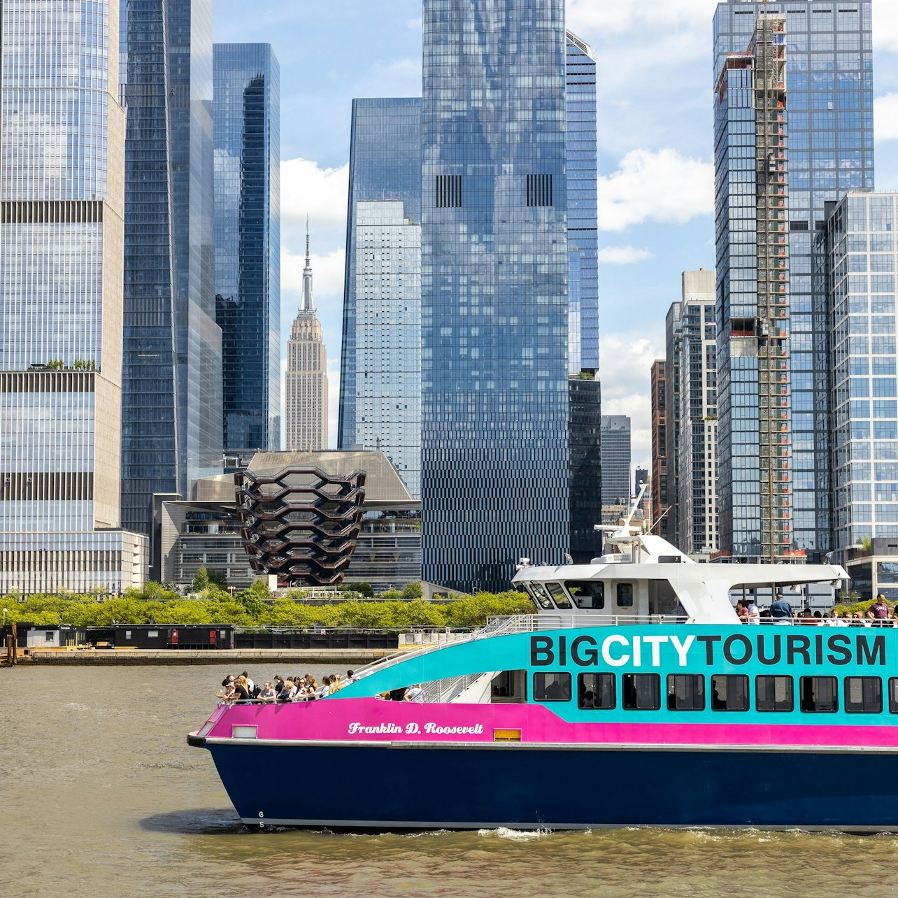 Sail past iconic New York landmarks aboard the eco-friendly Freedom Liberty Cruise capturing unforgettable views of the skyline bridges and the Statue of Liberty on a memorable journey.